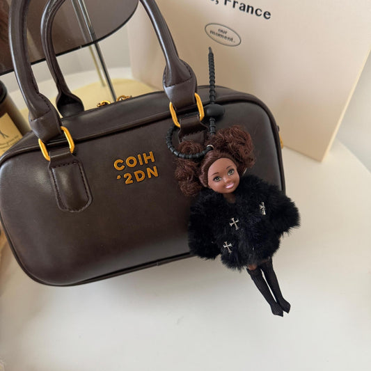 Barbie princess bag charm with fur outfit, cute and luxurious winter accessory for designer bags.