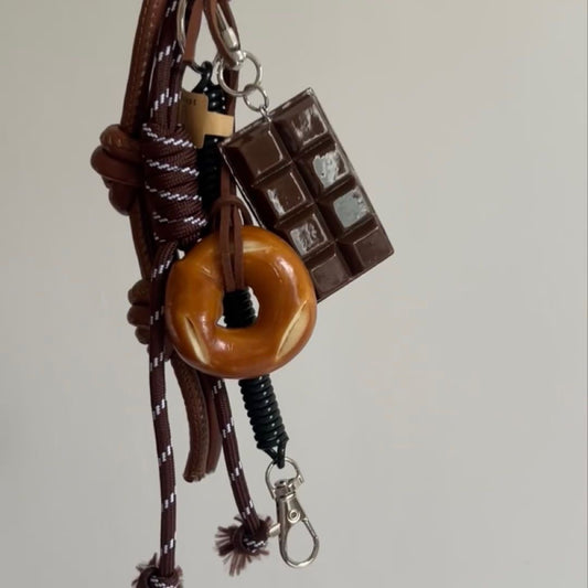 Handmade Pretzel Knot Bag Charm, unique and trendy accessory for Miu Miu, Prada, LV, Coach, Balenciaga, Fendi, Loewe bags, perfect gift idea.