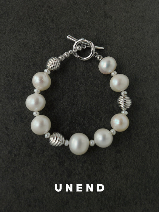 Tide of Time Pearl Ball Bracelet