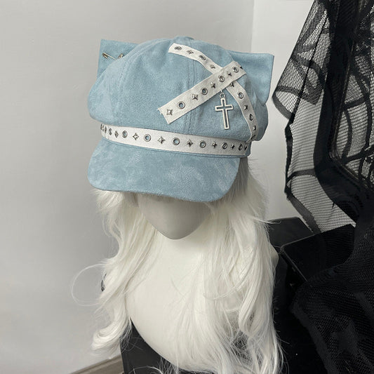 Pastel blue cat ear newsboy cap with white grommet webbing, Cyber-pop style.