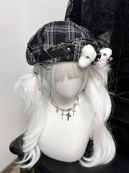 Black and grey plaid cyber-punk beret featuring metal safety pins and industrial hardware.