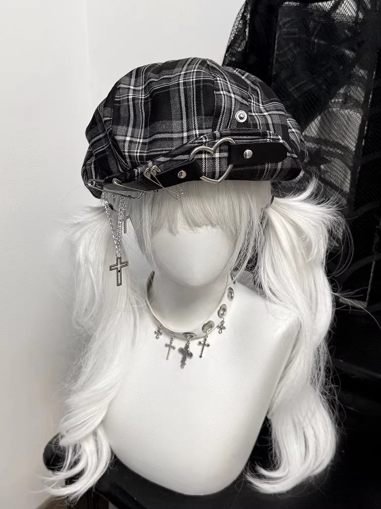 Black and grey plaid cyber-punk beret featuring metal safety pins and industrial hardware.