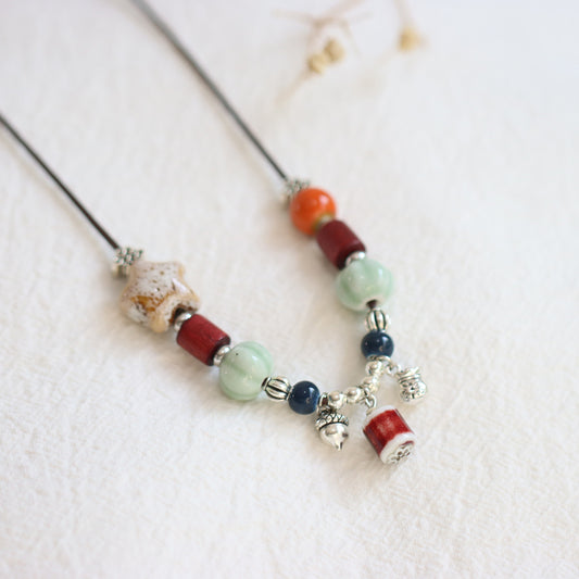 Ceramic Characters of Luck and  Prosperity Necklace