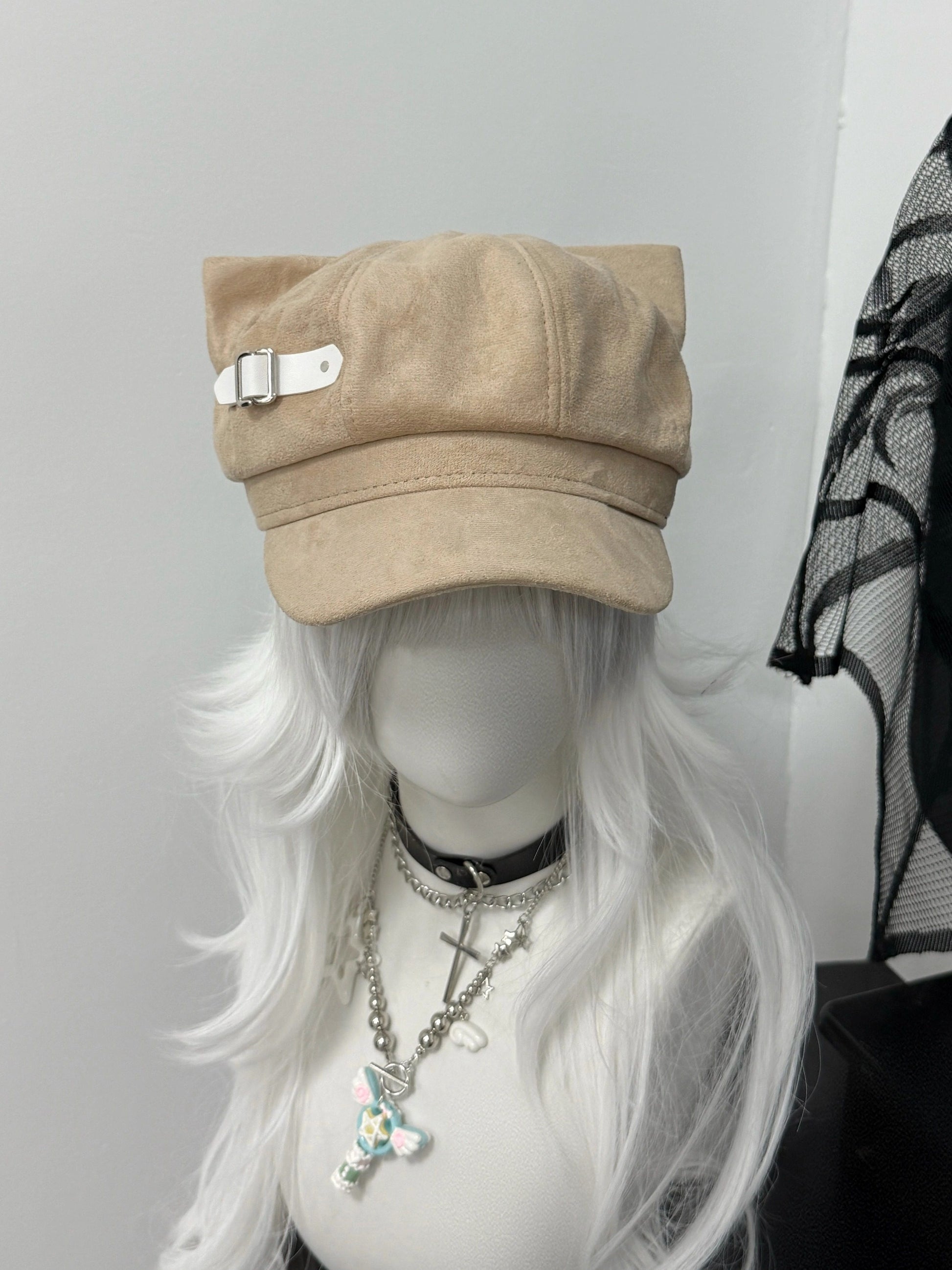 Khaki earth-tone cat ear cabbie hat with white leather strap, Mori Kei style.