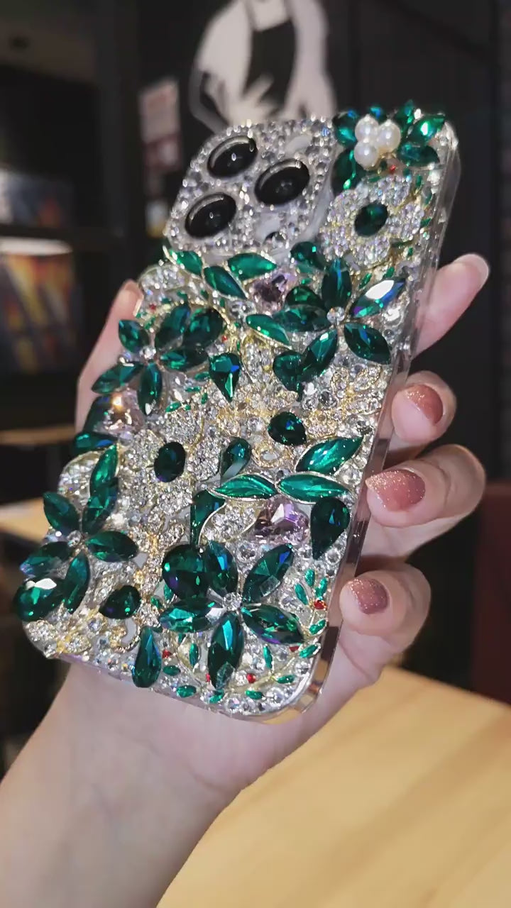  A close-up video showcasing the sparkling green Flora rhinestone phone case, highlighting its customizable design and shimmering details, perfect for iPhone users who love bold, party-ready accessories.